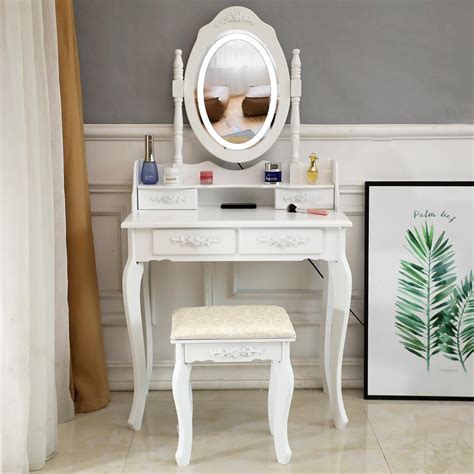 Its streamlined base is crafted from solid and manufactured wood with a brown oak finish, and is capped with a carrara marble surface and ceramic undermount sink, so all you need to add is a faucet. White Vanity Set with Lighted Mirror & Stool Drawer Women ...