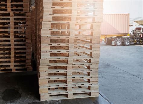 Premium Photo Stack Of Wooden Pallets For Indutrial Transport