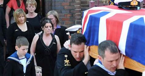 Hundreds turn out to pay respects to naval officer killed in submarine