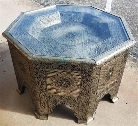 Good antique condition with minor signs of use. Moroccan Metal Inlaid Coffee Table, Glass Top Added For ...