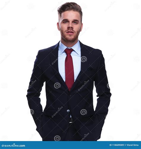 Portrait Of Elegant Attractive Businessman With Hands In Pockets Stock