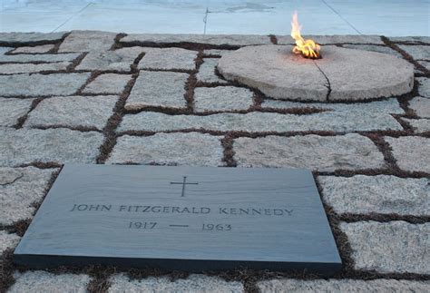 president john f kennedy s grave marker and eternal flame at arlington national cemetery
