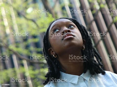 Portrait Of A Black Woman Looking Up Stock Photo Download Image Now