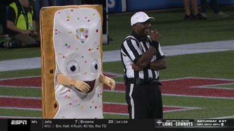 The Pop Tarts Bowl Mascot Menacingly Creeping Behind A Referee Became