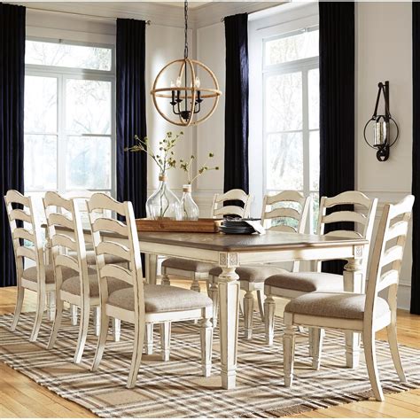 Signature Design By Ashley Realyn 9 Piece Rectangular Table And Chair