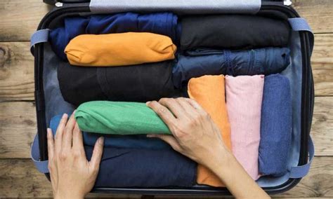 How To Roll Clothes For Packing Cubes Organizing Edge