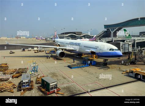Hong Kong March 1 2023 Airplane At Boarding Gate Jet Bridge In Hong