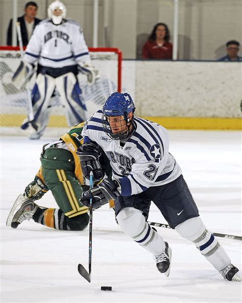 Royalty Free Photo Male Ice Hockey Player Skating Together With Puck