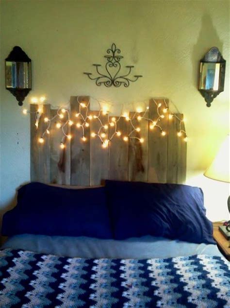 This headboard is a great way to light up a room with luminescence without another lamp taking up more space. DIY Pallet Headboard with Lights | 99 Pallets