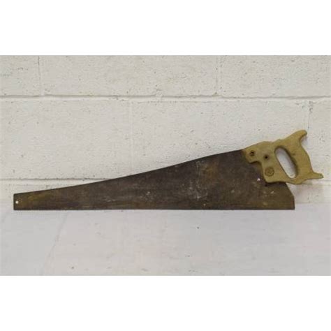 If it's a photo on a website like ebay, the image search might show you the source of the photo leading to further identification. Antique Hand Saw
