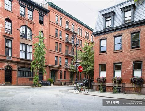 Urban Neighborhood Street Corner With Traditional Buildings New York