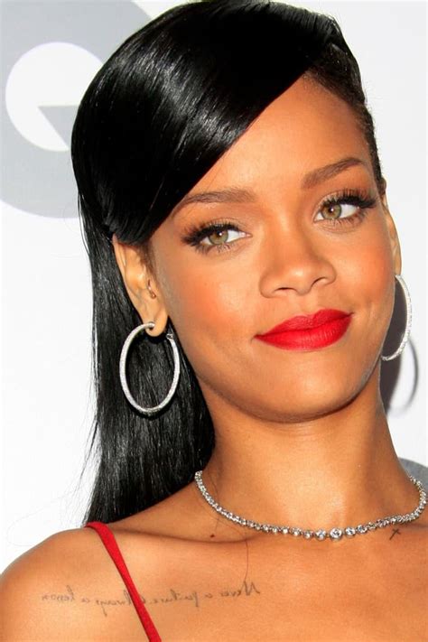 Rihannas Tattoos And What They Mean 2021 Celebrity Ink Guide