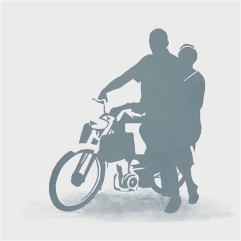Two People Standing Next To Each Other On A Bike With The Shadow Of