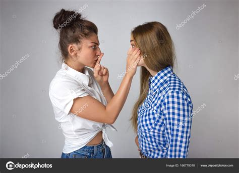 Woman Covering Her Sisterster Mouth Hand Holding Finger Lips Silent
