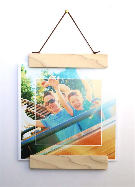 This diy photo holder we made was used to display photos at our son's first birthday party. DIY modern wood + magnet photo frame - It's Always Autumn