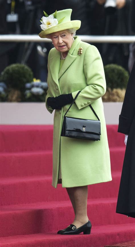 Queen Elizabeths Regal Rainbow Style Through The Years Yellow Coat Blue
