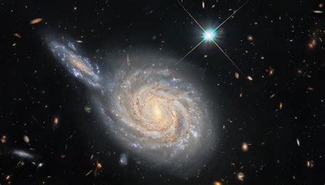 Hubble Space Telescope Observes Conjunction Of Two Spiral Galaxies