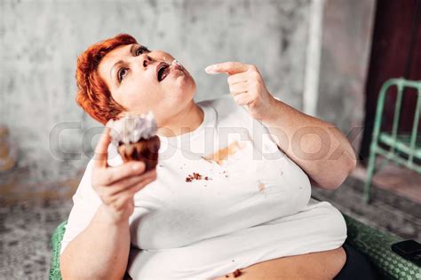 Overweight Woman Eats Sweet Cake Obesity Stock Image Colourbox
