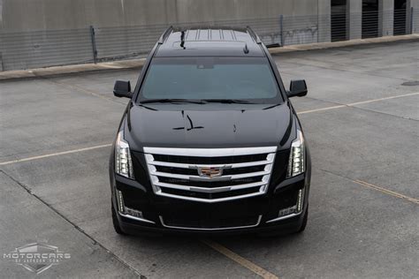 Cadillac does a the 2016 escalade isn't an suv you choose with either your head or your heart; 2016 Cadillac Escalade ESV Platinum 4WD Supercharged Over ...