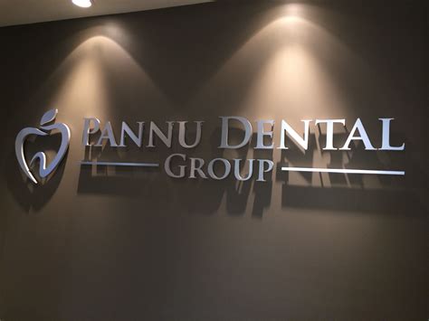 Brushed Metal Finish Dentist Office Wall Sign Mounted With Studs And