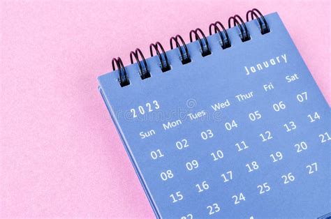 The January 2023 Monthly Desk Calendar For 2023 Year On Pink Colour
