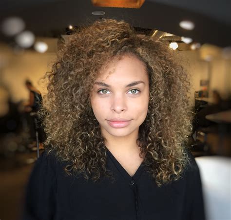 This particular haircut lasts 3 to 6 months for the curliest hair of them all. Embrace Your Curls with a Deva Cut by DevaCurl | Stella Luca
