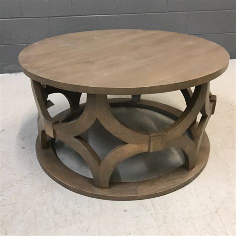 Very well made, and the height is great! Carved Round Coffee Table - Nadeau Nashville
