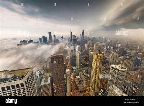 Chicago Illinois Usa Skyline From Above With Storm Clouds And Fog