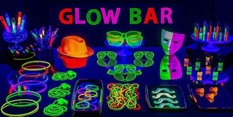 neon glow party supplies on a table with the words glow bar
