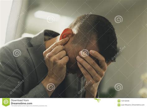 Suffering Man With His Hands In His Head Stock Photo Image Of Hearing