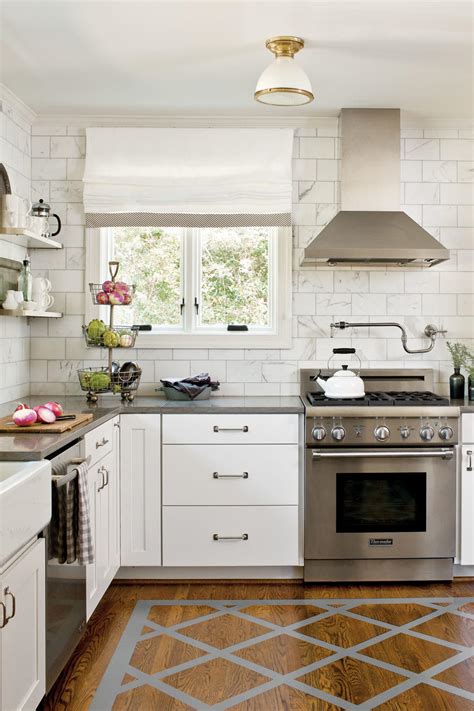 Opt for a round ceiling light that makes the kitchen look classy. Crisp & Classic White Kitchen Cabinets - Southern Living