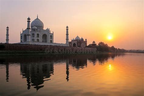 Taj Mahal Reflected In Yamuna River At Sunset In Agra India Stock