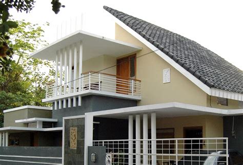 Selain rumah kayu berwarna gelap, desain rumah atap miring juga dapat dikombinasikan dengan rumah berbentuk kubisme yang terbuat dari batu bata. Desain Atap Rumah Miring Satu Sisi - Desain.id