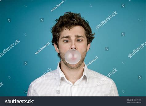 Man Blowing Bubble With Gum Stock Photo 34695997