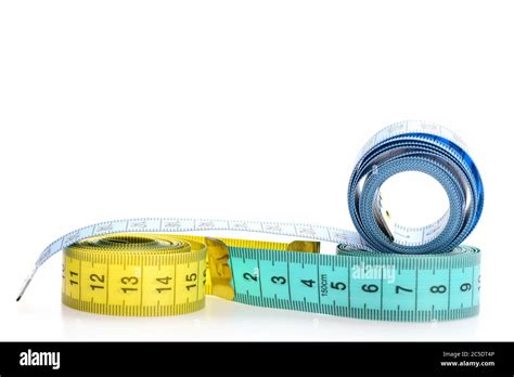Yellow And Blue Rolled Measuring Tapes Isolated On White Background