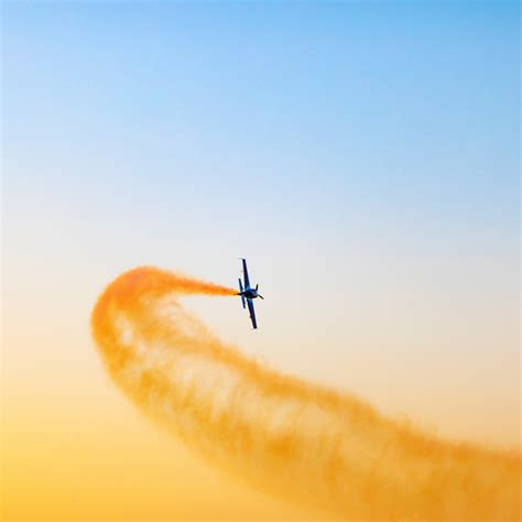 Download Wallpaper 2932x2932 Airplane Clean Sky Yellow Smoke Flight
