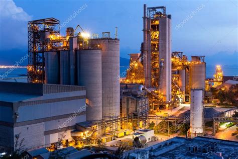 Industrial Buildings At Large Factory At Night Stock Photo By