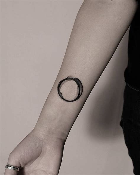 Abstract Circle Tattoo On The Inner Wrist