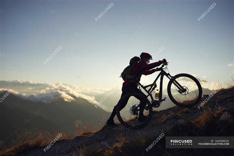 Mountain Biker Pushing Bike Uphill Valais Switzerland — Silhouette