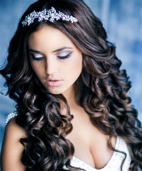 Long wavy hair with bangs is a youthful and feminine hairstyle that you can dress up or down. Wedding Hairstyles for Long Hair