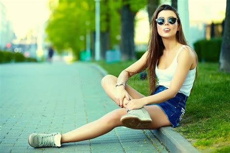 Stylish Model In Casual Summer Hipster Cloth In The Street Stock Photo