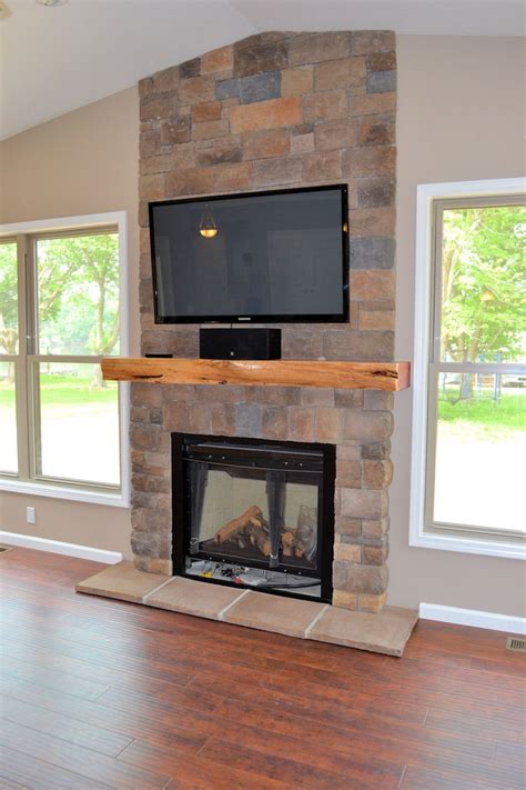 Wood tile fireplace surround image and description. 20+ Awesome Fireplace Tile Ideas
