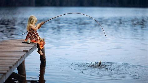 Little Blonde Girl Fishing In A Lake Wonderful Photo