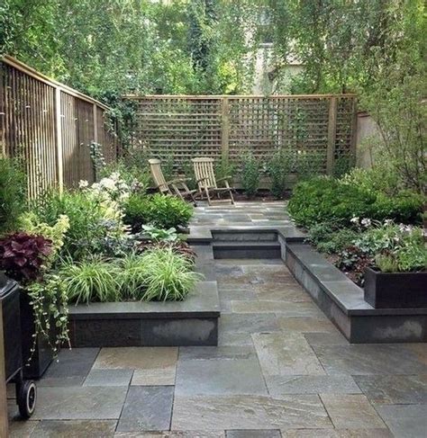 Raised Paving Area With Planting Areas And Privacy Screening Small
