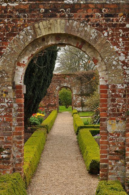 Arches In A Walled Garden Garden Wall Beautiful Gardens Dream Garden