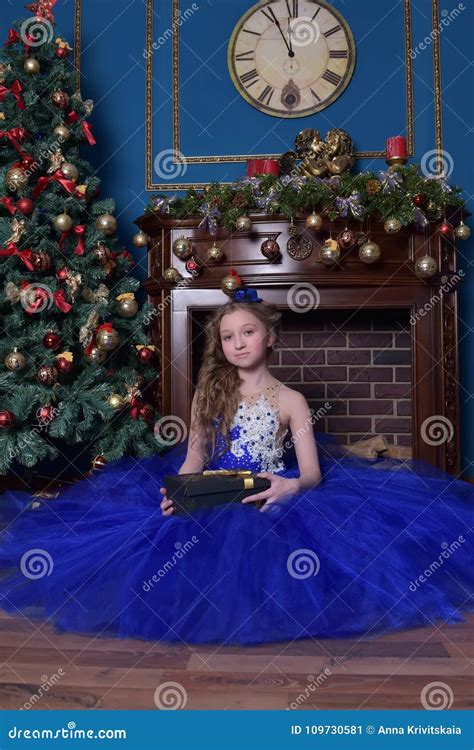 Girl In Blue Dress Sits By Fireplace Stock Image Image Of Blue Love