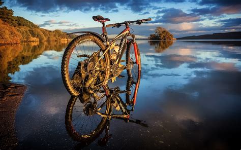 Black White And Orange Mountain Bike Bicycle Water Landscape