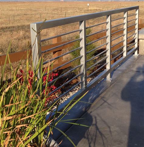 Residential railings create a more subtle look than other railing options might provide. Modern patio railing With Horizontal pickets powder coated ...