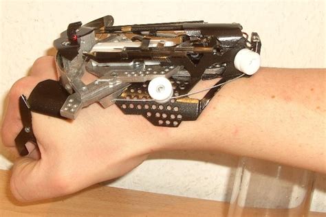Hobbyist Builds Wrist Mounted Laser Sighted Crossbow