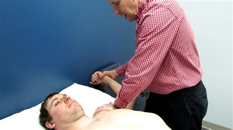 Shoulder Apprehension And Relocation Test On Real Patient With A
